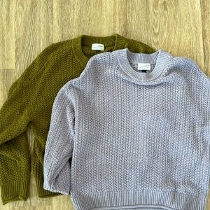 2 Universal Threat knit sweaters